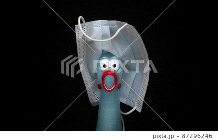 image of rubber chicken mask dark background image of rubber chicken mask dark background 87296246