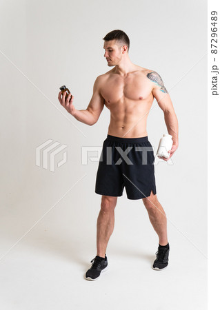 Fitness protein jars white on white background bodybuilder powder strong high back sore injury, spine massage medicine, human Tension sickness, disease suffer attractive 87296489