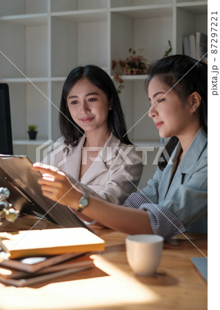 Group of Businesswoman and Accountant checking data document on digital tablet for investigation of corruption account . Anti Bribery concept. Group of Businesswoman and Accountant checking data document on digital tablet for investigation of corruption account . Anti Bribery concept. 87297221