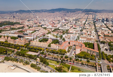 Aerial view of Barcelona cityscape with a modern apartment buildings 87297445