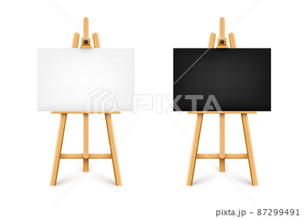 Realistic paint desk with blank black and white canvas. Wooden easel and a sheet of drawing paper 87299491
