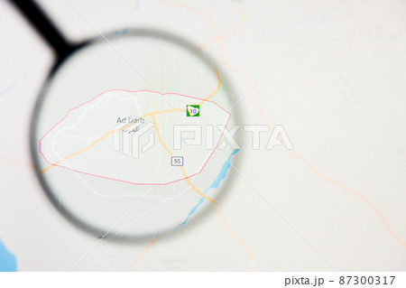 Ad Darb city in Saudi Arabia visualization illustrative concept on display screen through magnifying glass Ad Darb city in Saudi Arabia visualization illustrative concept on display screen through magnifying glass 87300317