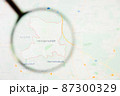 Herzogenaurach city in Germany, Bavaria visualization illustrative concept on display screen through magnifying glass 87300329
