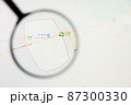Al Qurayn city in Saudi Arabia visualization illustrative concept on display screen through magnifying glass 87300330
