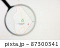 Al Artawiyah city in Saudi Arabia visualization illustrative concept on display screen through magnifying glass 87300341