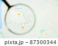 Geretsried city in Germany, Bavaria visualization illustrative concept on display screen through magnifying glass 87300344