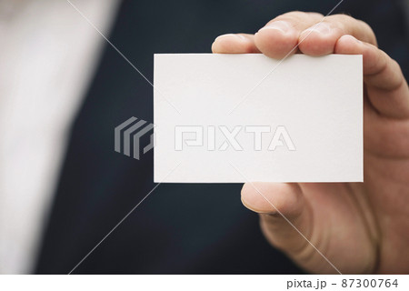 close up visiting card hand 87300764