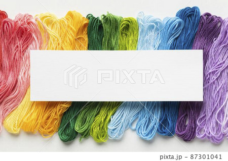 colorful thread arrangement flat lay colorful thread arrangement flat lay 87301041