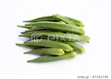 Fresh okra on white background. Fresh okra on white background. 87301746