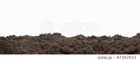 fertile soil or isolated mound of soil on a white background. 87302032