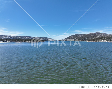 Aerial view of Big Bear Lake during winter season, San Bernardino National Forest, CA  87303075