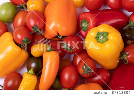 Full frame shot of fresh organic tomatoes and bell peppers, copy space 87312804