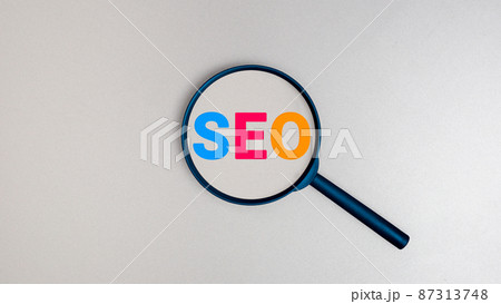 SEO Search Engine Optimization concept, Magnifying glass with text SEO. SEO Search Engine Optimization concept, Magnifying glass with text SEO. 87313748