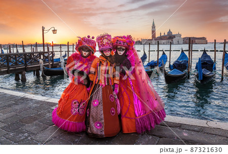 Colorful carnival masks at a traditional festival in Venice, Italy 87321630