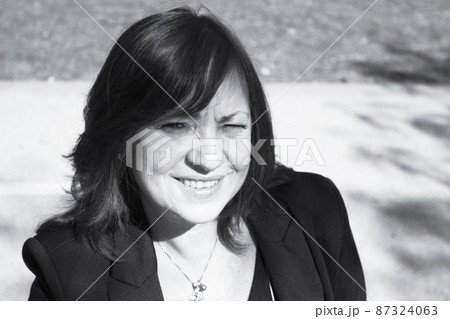 Mature woman in positive attitude Mature woman in positive attitude 87324063