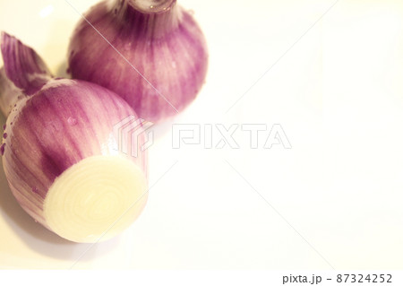 Uncooked purple chives in the kitchen Uncooked purple chives in the kitchen 87324252