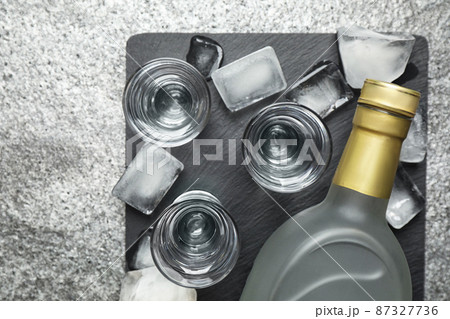 Cold Russian vodka on grey table, flat lay 87327736