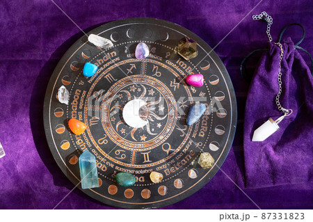 Healing crystals on brown background Healing crystals on brown background 87331823