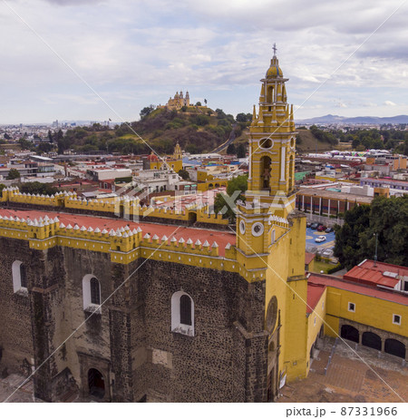 Aerial Drone Shot of San Gabriel Archangel Cathedral at cloudy day in Cholula, Puebla, Mexico 87331966
