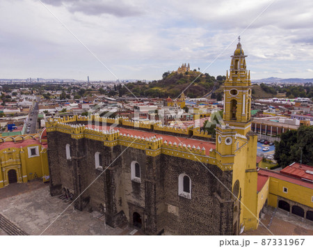 Aerial Drone Shot of San Gabriel Archangel Cathedral at cloudy day in Cholula, Puebla, Mexico 87331967