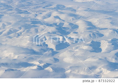 Aerial view of snow-capped mountains Aerial view of snow-capped mountains 87332022