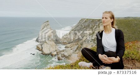 Young traveler at Cabo Da Roca in Portugal at the Atlantic Ocean Young traveler at Cabo Da Roca in Portugal at the Atlantic Ocean 87337516
