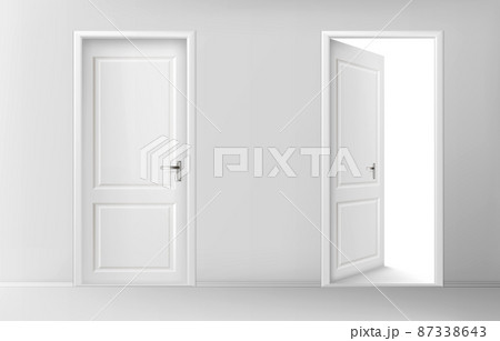 Open and closed white wooden doors 87338643