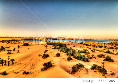 Aerial sunrise Panoramic view to Yoa lake group of Ounianga kebir lakes at the Ennedi, Chad 87343085