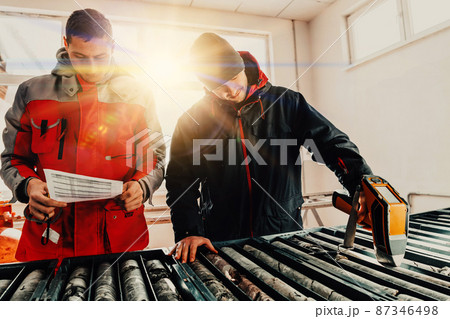 A special team of geologists who study rocks in industry using modern machines.Selective focus  87346498
