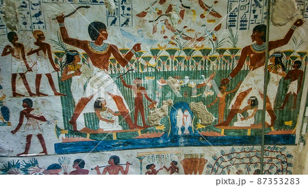 Luxor, Egypt: Corridor with ancient Egyptian inscriptions and hieroglyphs in a tomb. Luxor, Egypt: Corridor with ancient Egyptian inscriptions and hieroglyphs in a tomb. 87353283