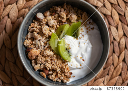 Homemade granola and yogurt Homemade granola and yogurt 87353902