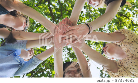Group of female hands together in the park. Group of female hands together in the park. 87354635