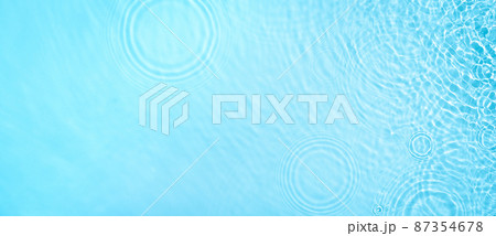transparent blue colored clear calm water surface texture  87354678