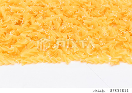 Uncooked Fusilli Pasta with Copy Space 87355811