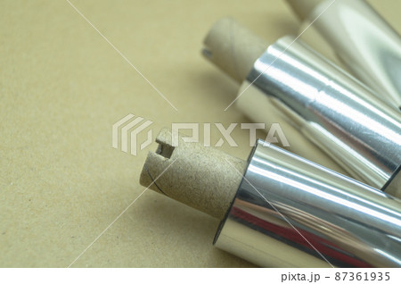 Thermal transfer ribbon - TTR. Wax thermo ribbon on cardboard reel for barcode. Supply material for printing industry. Selective focus Thermal transfer ribbon - TTR. Wax thermo ribbon on cardboard reel for barcode. Supply material for printing industry. Selective focus 87361935
