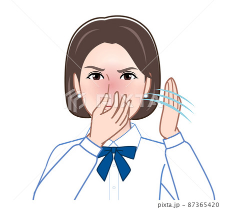 匂いが臭いとポーズをする女性 87365420