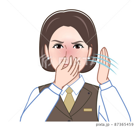 匂いが臭いとポーズをする女性 87365459