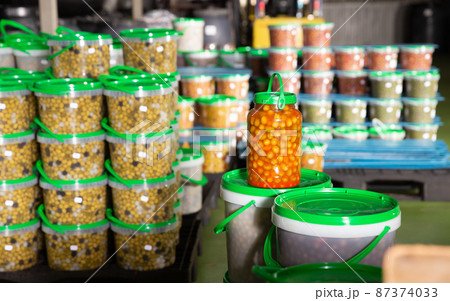 Pickled olives in plastic buckets Pickled olives in plastic buckets 87374033