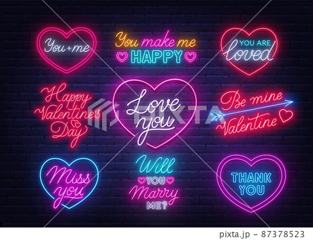 Happy Valentine's day neon quotes on brick wall background. Glowing Greeting Cards. Happy Valentine's day neon quotes on brick wall background. Glowing Greeting Cards. 87378523