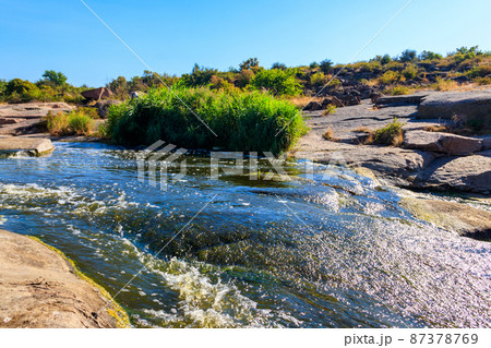 View of Tokovsky waterfalls on the Kamenka river in Dnipropetrovsk region, Ukraine 87378769