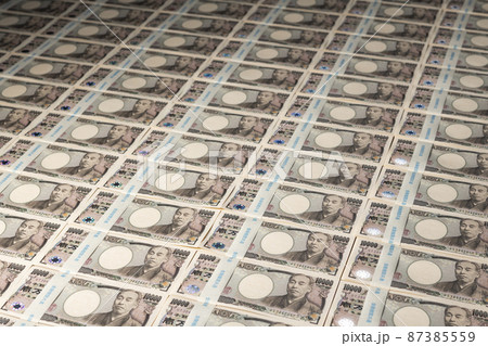 きれいに並べられた一万円の札束 87385559