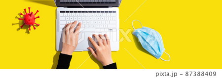 Laptop computer with a facial mask 87388409