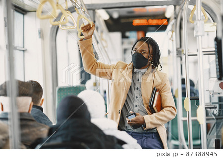 Young African businessman in a bus 87388945