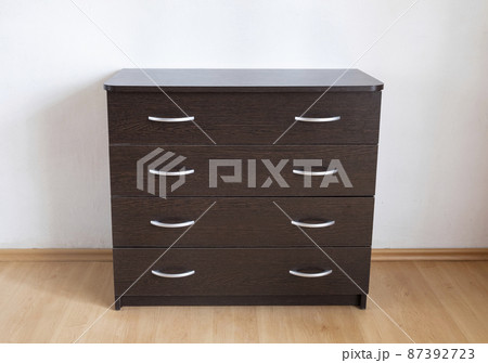 Chest of drawers with four drawers and metal handles. Step-by-step instructions for assembling a chest of drawers dark wood 87392723