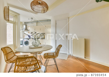 Kitchen in classic white with all the necessary equipment for use 87393454