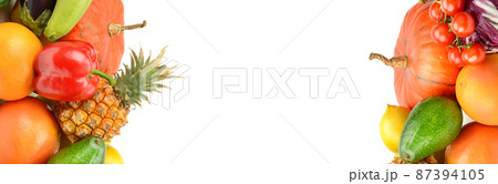 Fruits and vegetables isolated on white background. Free space for text. Wide photo. Fruits and vegetables isolated on white background. Free space for text. Wide photo. 87394105