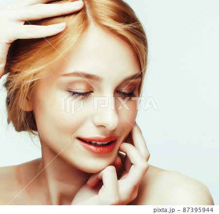 young sweet ginger woman close up isolated on white background, perfect pure innocense beautiful young sweet ginger woman close up isolated on white background, perfect pure innocense beautiful 87395944