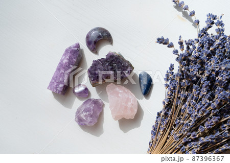 Healing crystals on brown background 87396367