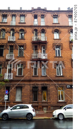 Facade view of a neoclassical brick building, in Republica Arabe and Cabello streets. Buenos Aires, Argentina 87400705