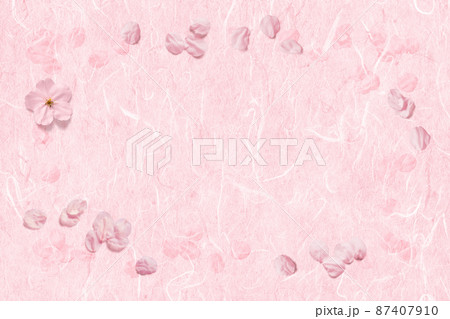 漉き込んだ桜と舞い散る桜、花びらフレームの桃色和紙 漉き込んだ桜と舞い散る桜、花びらフレームの桃色和紙 87407910